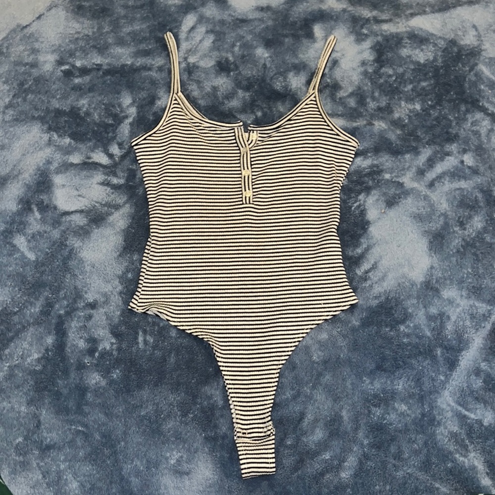 Garage, black and white stripped body suit, with buttons